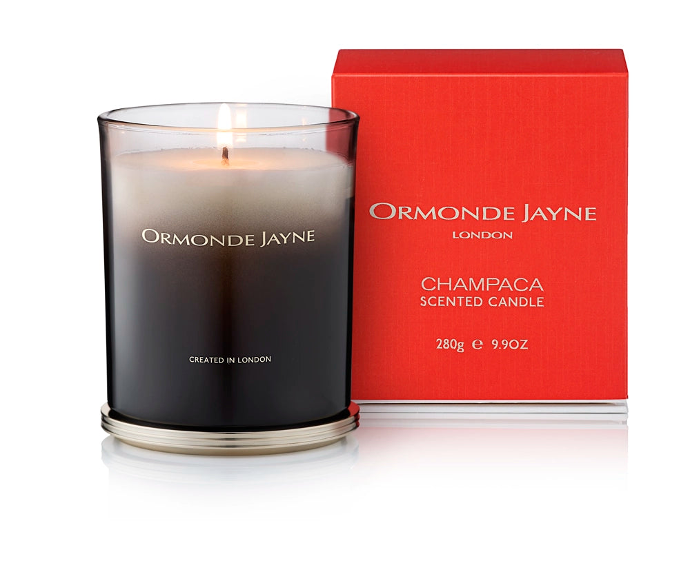 Black glass scented candle with silver base and red packaging box by Ormonde Jayne