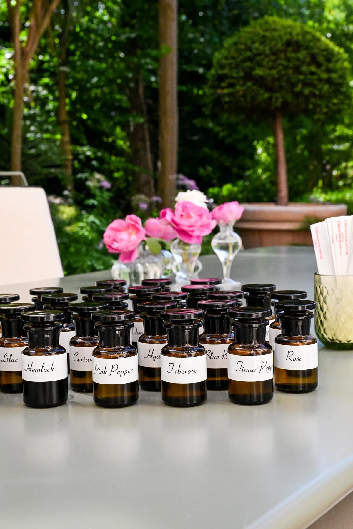 Labelled perfume oils in the garden