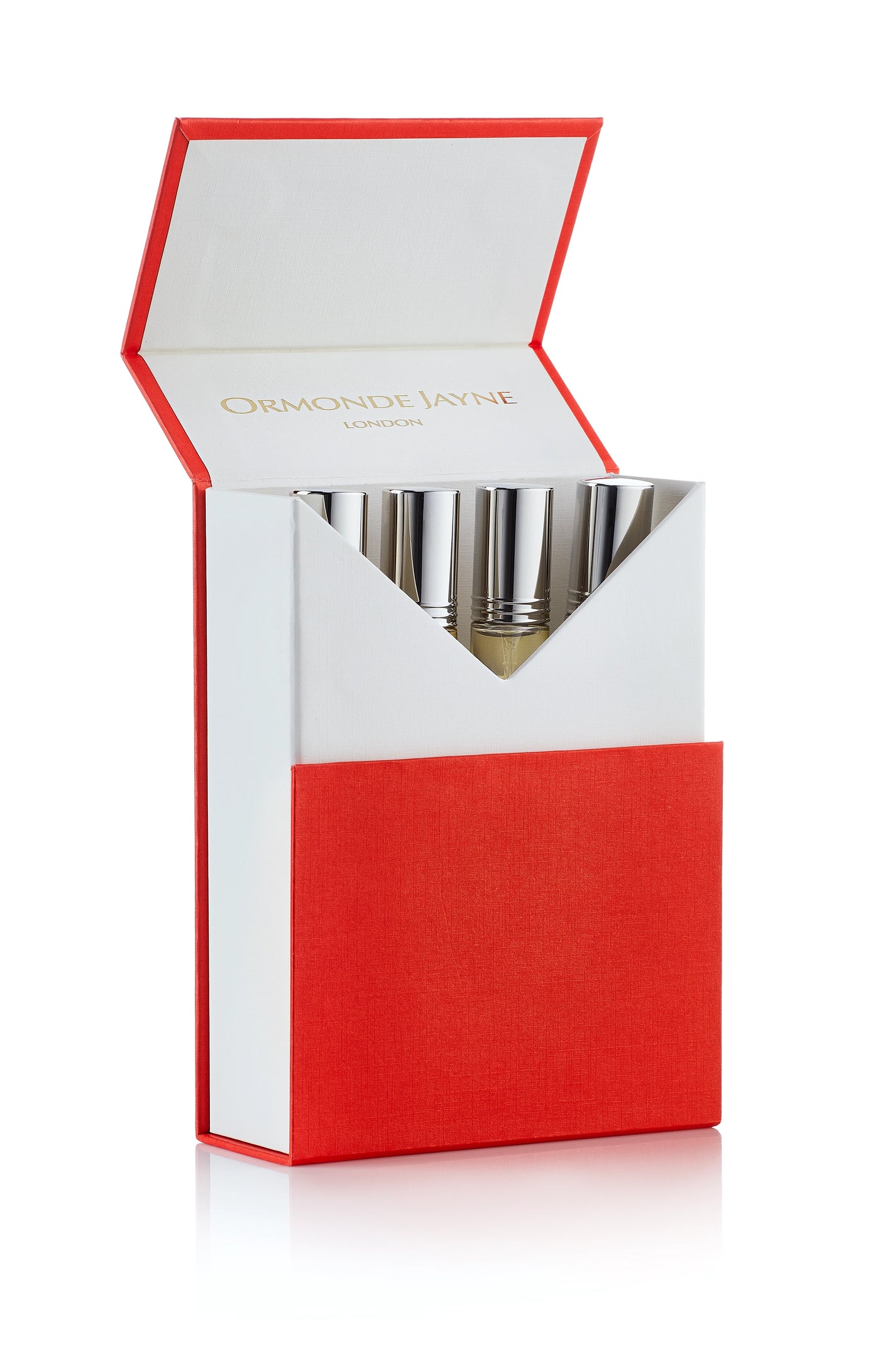 Set of silver fragrance spray bottles in red and white box with frangipani scent
