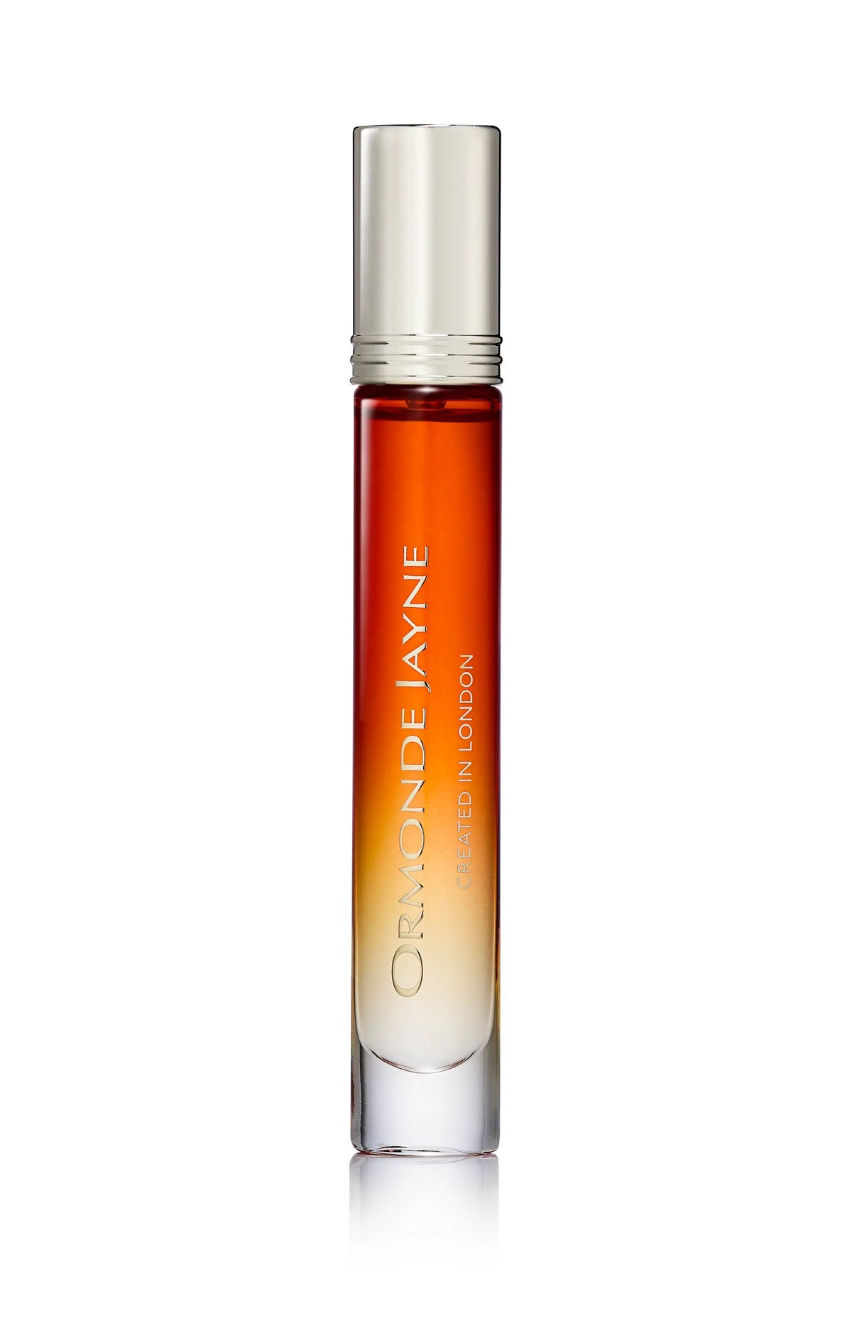 Slim glass perfume bottle with gradient amber to clear colour and silver cap