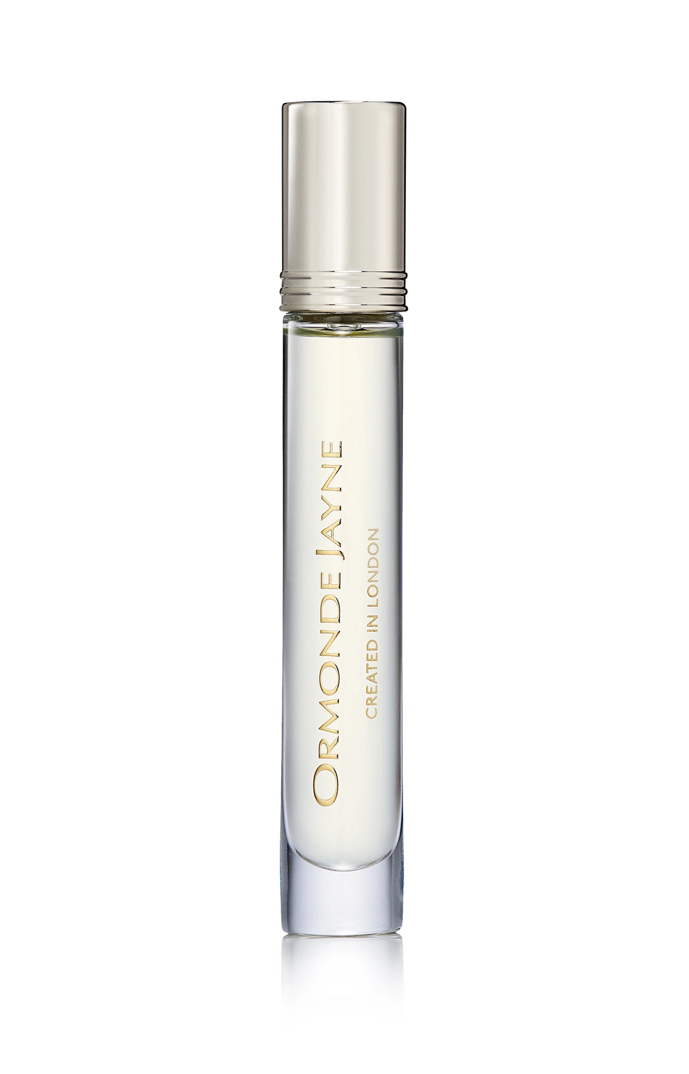 Slim clear glass perfume bottle with silver cap and gold lettering