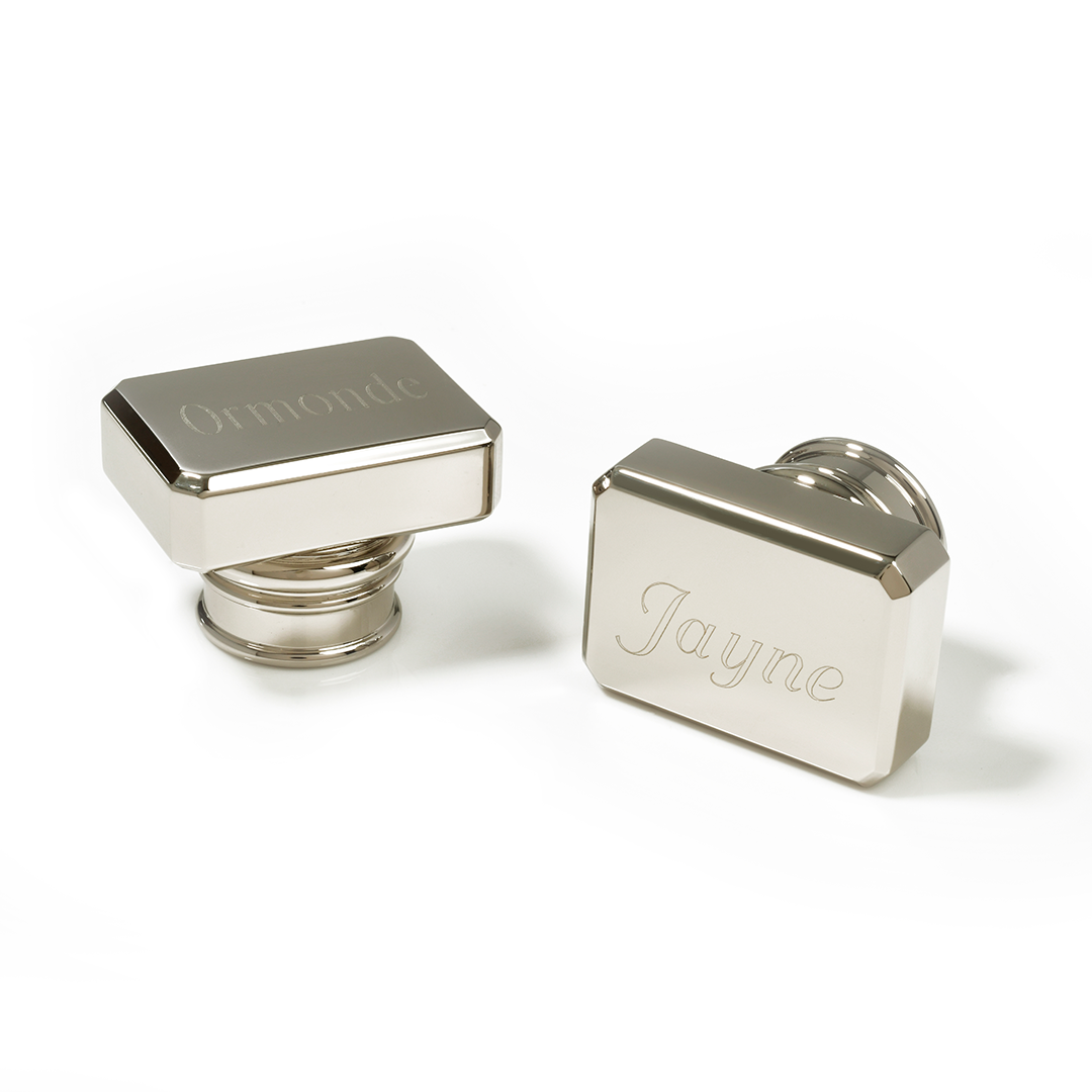 Pair of silver rectangular metal stamps engraved with names Ormonde and Jayne