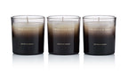 Set of three black to beige gradient scented candles in glass holders with Ormonde Jayne branding