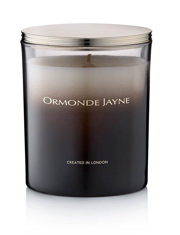 Black glass candle jar with silver lid, labelled Ormonde Jayne Casablanca Lily scented candle