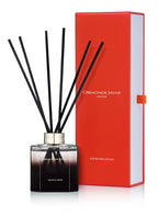 Black scented reed diffuser with gradient glass bottle and orange packaging box