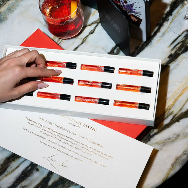 Tasting Menu vials on a marble table