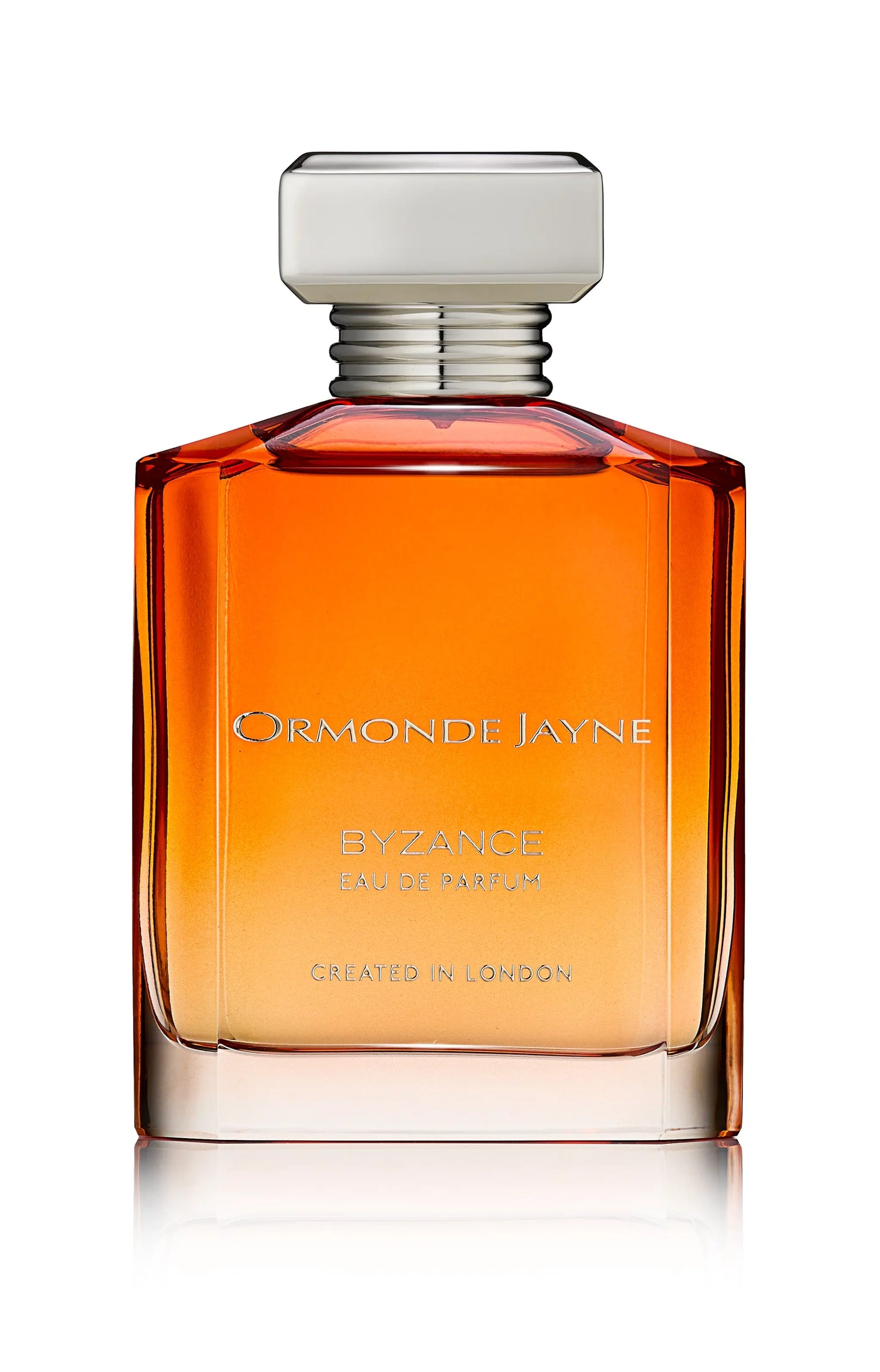 Byzance eau de parfum in a gradient amber to clear glass bottle with silver cap