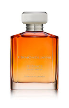 Byzance eau de parfum in a gradient amber to clear glass bottle with silver cap