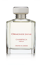 Clear glass perfume bottle with silver cap and red text, labelled Ormonde Jayne Champaca Parfum