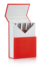 Set of silver-capped perfume bottles in red and white luxury box with damask branding