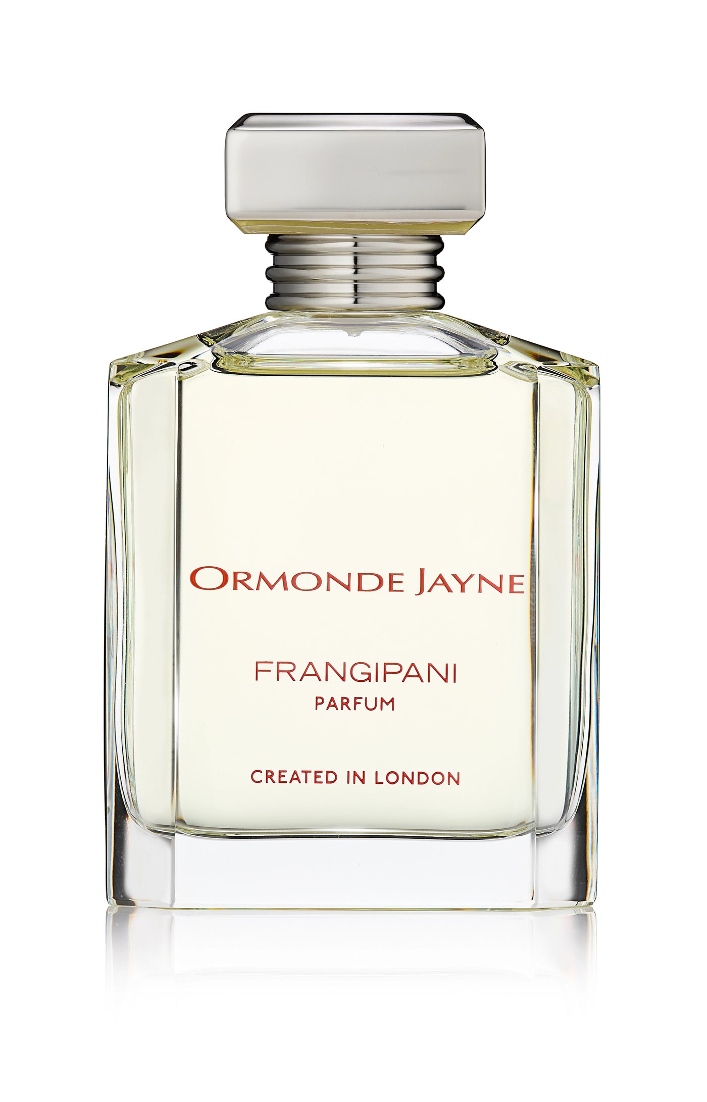 Clear glass perfume bottle with silver cap containing pale yellow Frangipani parfum