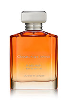Amber-coloured glass perfume bottle with silver cap labelled Ormonde Jayne Kashmir