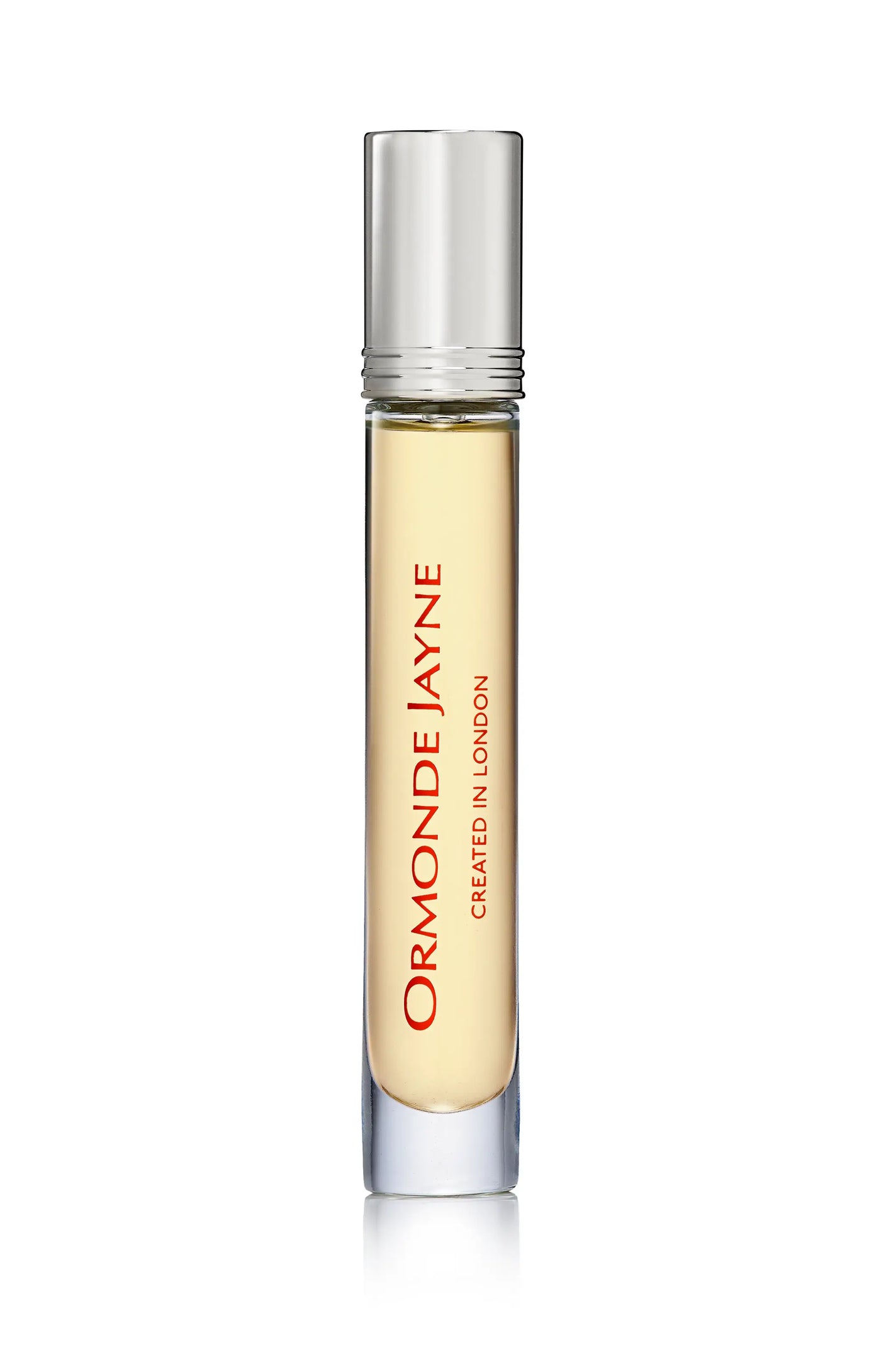 Slim glass bottle with silver cap containing pale yellow Ormonde Jayne perfume