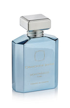Light blue Montabaco Cuba perfume bottle with silver cap and gold lettering