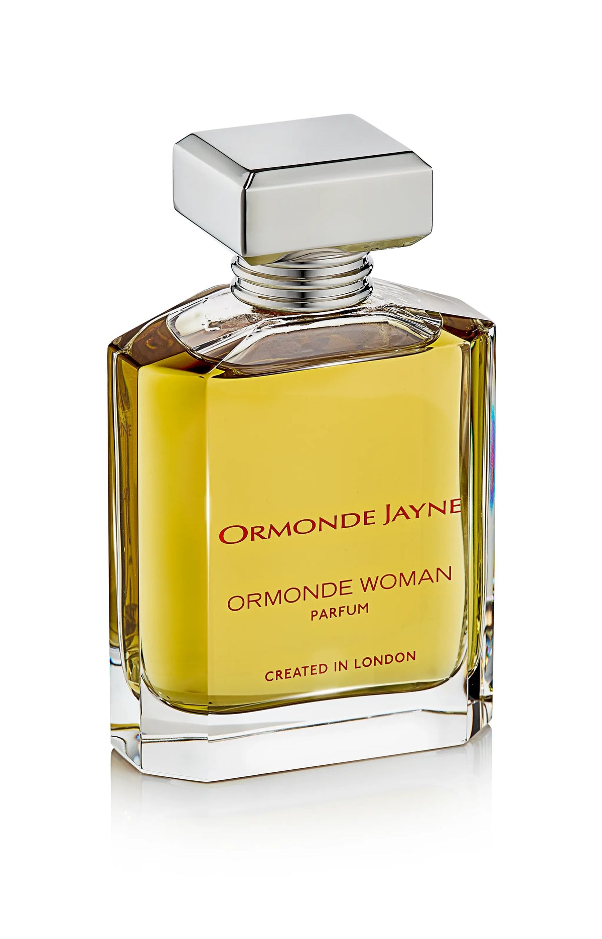 Ormonde Woman parfum in a clear rectangular glass bottle with silver cap and golden liquid