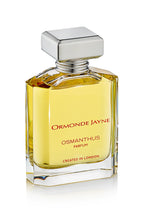 Rectangular glass perfume bottle with golden Osmanthus fragrance and silver cap