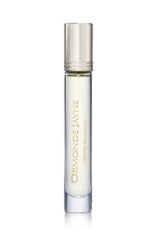 Clear glass rollerball bottle with silver cap containing Qi Intensivo fragrance