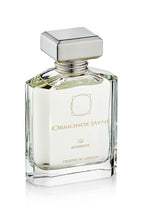 Clear glass perfume bottle with silver cap and gold lettering, Ormonde Jayne Qi Intensivo