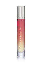Sleek gradient pink to cream lip gloss tube with silver cap and branding