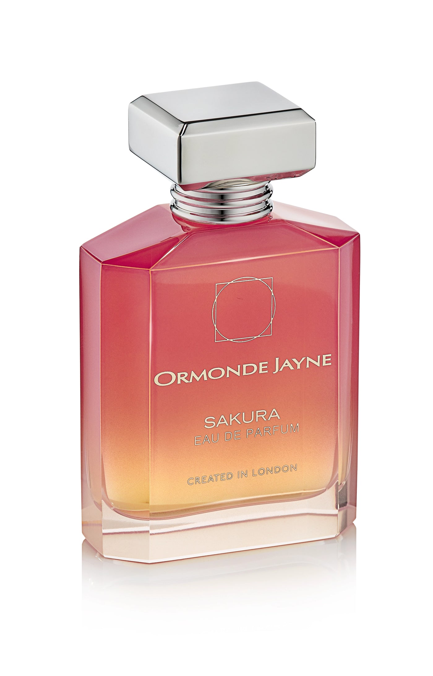 Sakura Eau de Parfum bottle with gradient pink to orange glass and silver cap