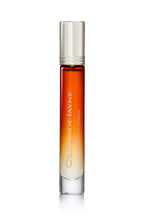 Slim glass perfume bottle with gradient amber to clear colour and silver cap