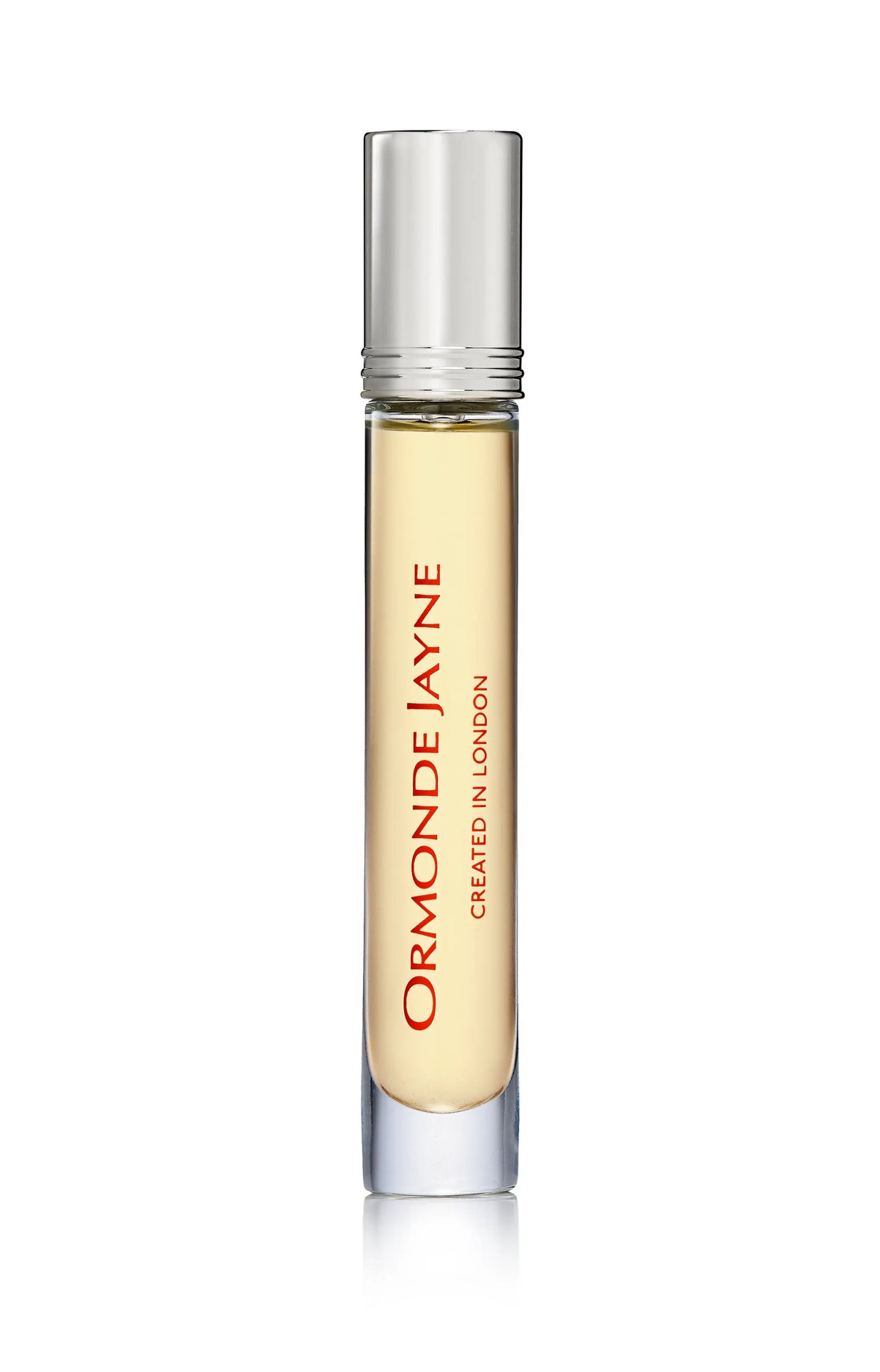 Slim glass bottle with silver cap containing pale yellow Tolu cologne by Ormonde Jayne