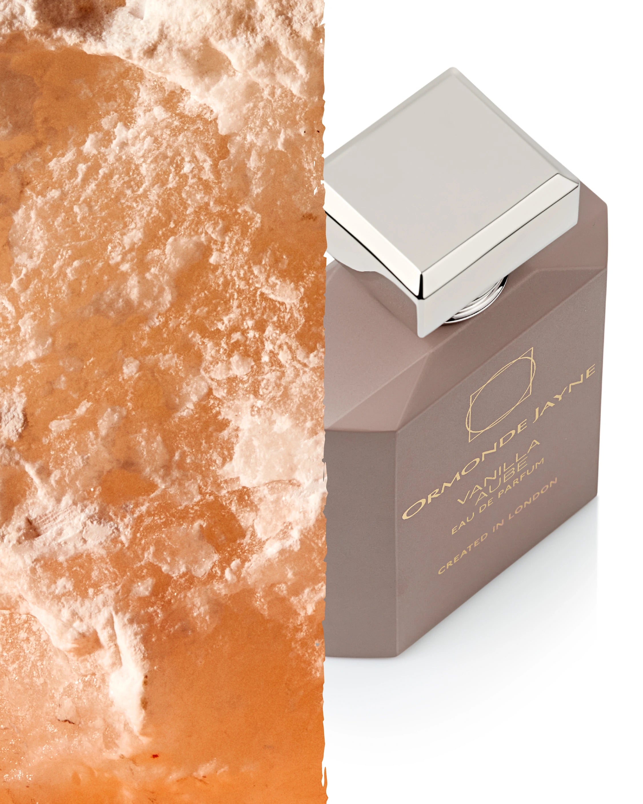 Ormonde Jayne Vanilla Aube bottle beside a pink Himalayan salt texture