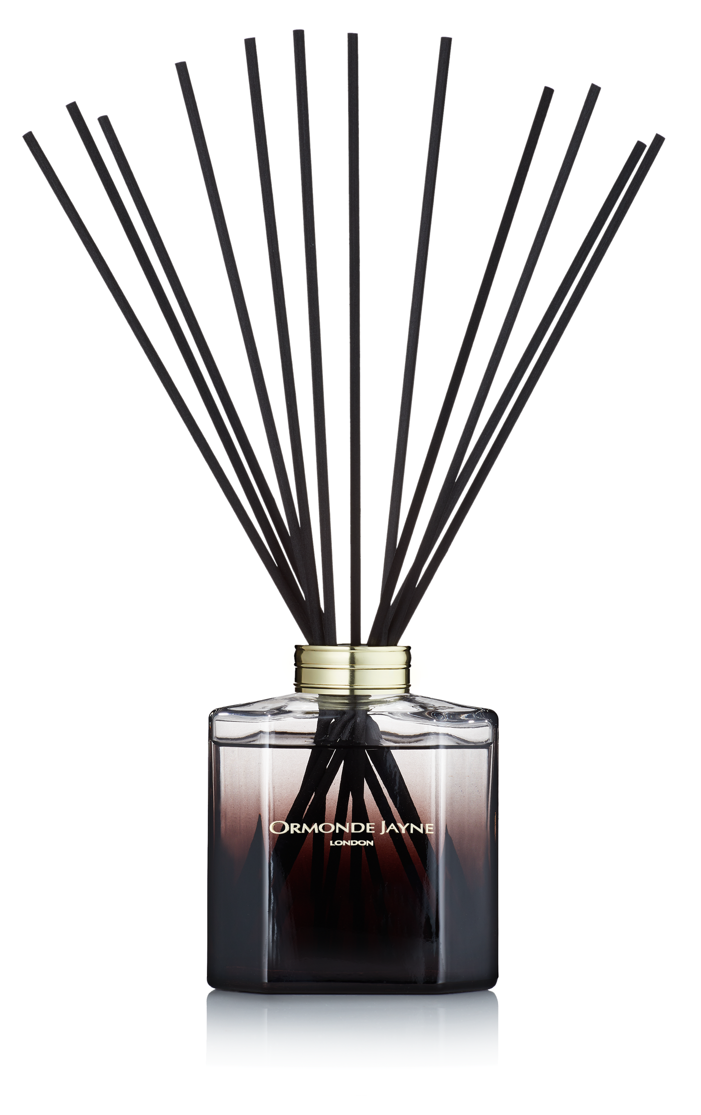 Montabaco scented reed diffuser with black sticks in a square smoky glass bottle