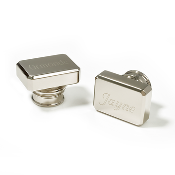 Pair of silver rectangular metal stamps engraved with names Ormonde and Jayne